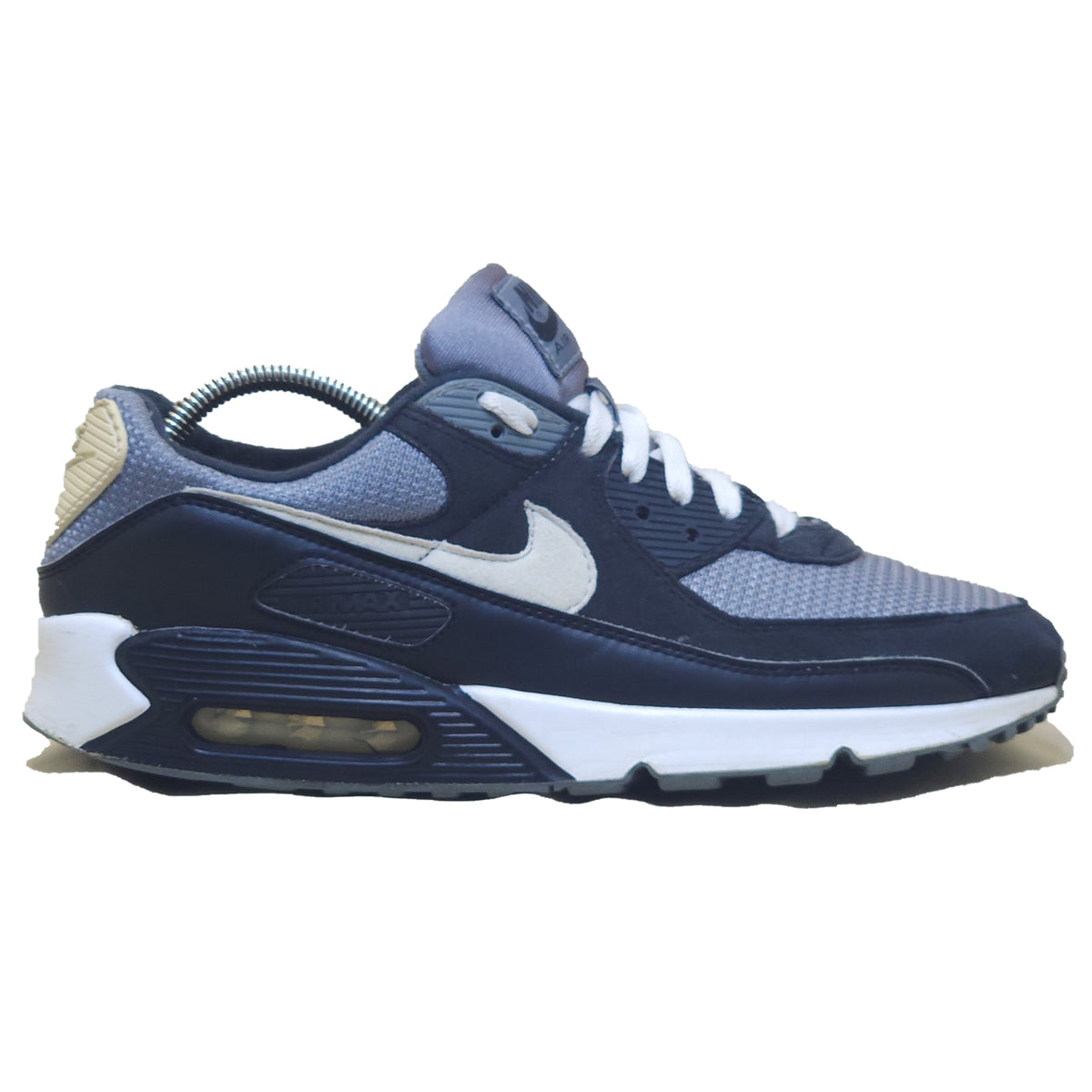 Nike Air Max 90 in a navy blue and grey colorway,