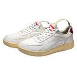 Men's white sneakers with red back strap